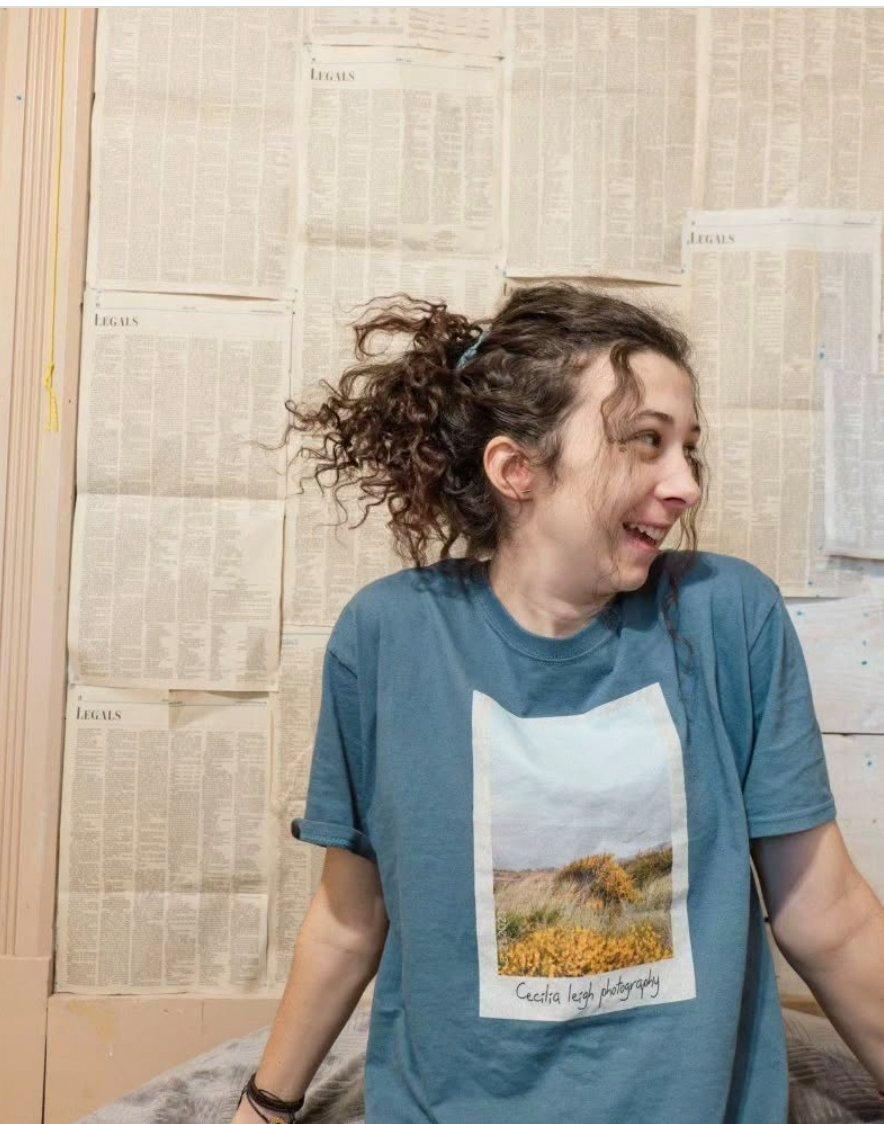 photographer wearing her own merch t-shirt